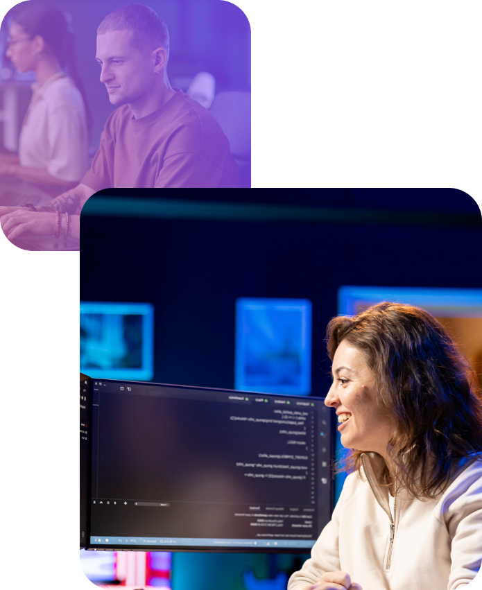 Pracownicy IT pracujący przy komputerach w nowoczesnym biurze &ndash; kontekst onboardingu i pracy zespołowej